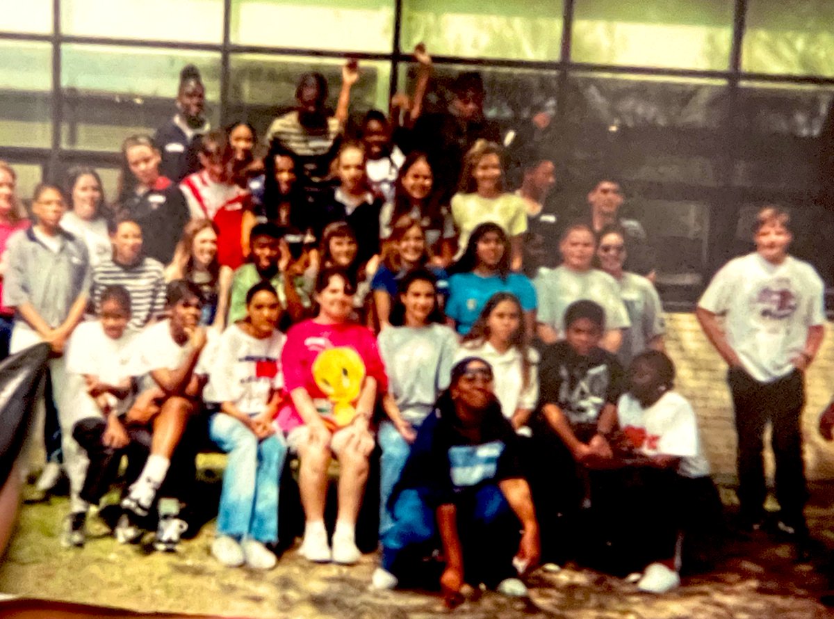 FaylitaHicks's tweet photo. In middle school, my family was houseless for a couple of years. Our church gave us a car and we pretty much wore whatever was donated to us. Somehow, I ended up getting exactly the clothes I wanted. That’s me squatting in the front w/ the blue top and ball cap. 😂#nb #queerkid https://t.co/TQwVkn0Xx6