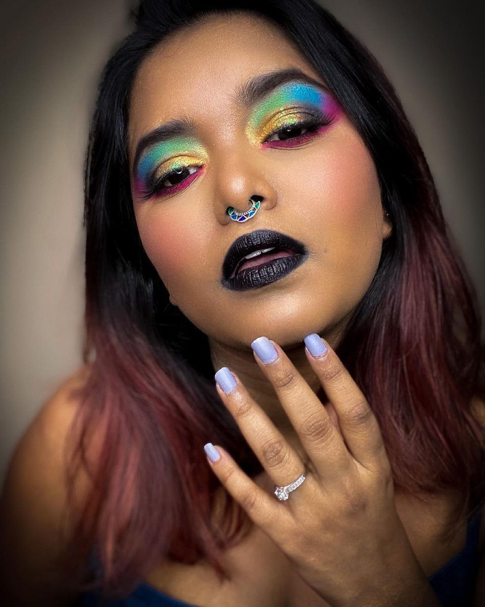 Rainbow bright 🌈✨ @makeupbysreshta adds the sparkle using the Bomb Dot Com palette. #rainbowmakeup #rainboweyeshadow #blacklipstick #brightmakeup #mua #beauty