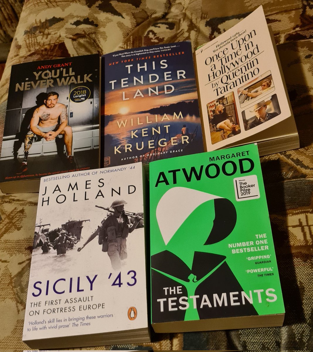 neilersmc's tweet image. Rosbeg 2021 holiday reading pile.  This Tender Land by William Kent Krueger came out top.  Commendable place to You'll Never Walk by Andy Grant