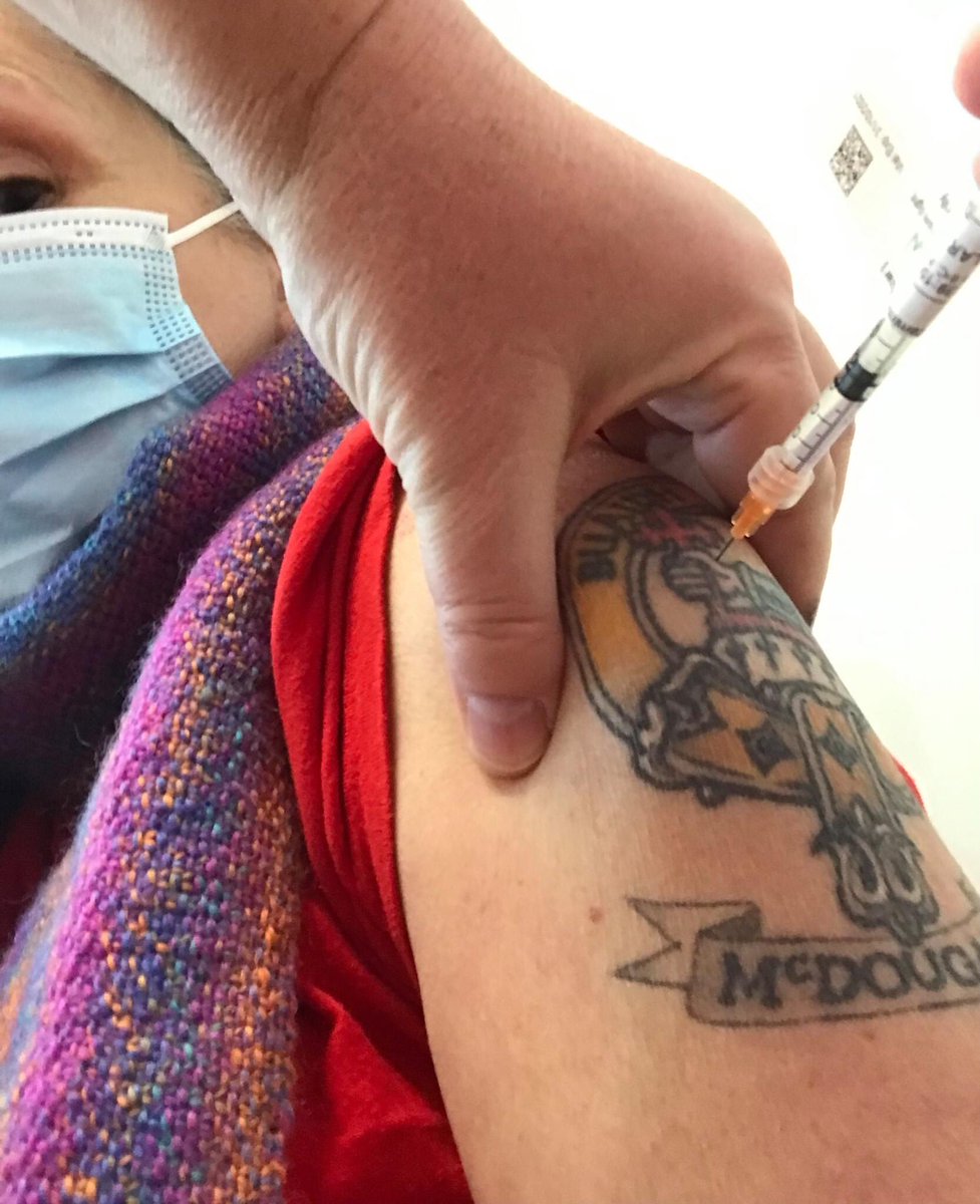 doctormcdougall's tweet photo. Me and my sister both showing off our sick matching ink at the vax clinic this week. #buaidhnobas #mcdougall #sickink https://t.co/g04cwWpP68
