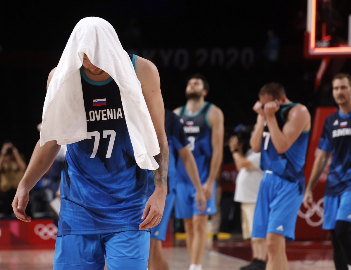 Slovenia‘s Luka Doncic walks off the court after losing to France in the semifinal 90-89. They will play Australia in the bronze medal game.