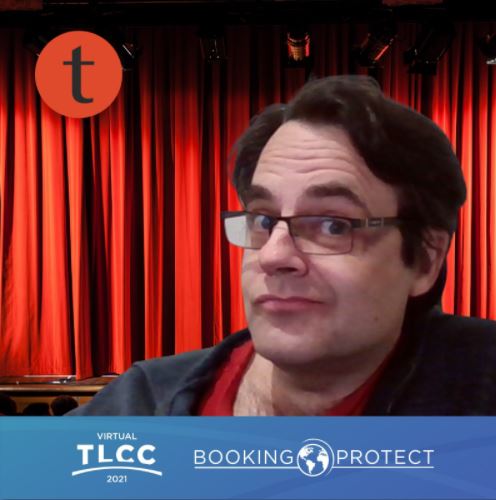 Smug Heath Wilder in front of a red curtain.  TLCC 2021 logo beneath