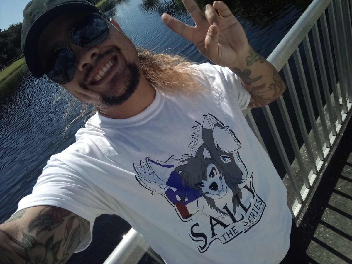 Spotty2Hotty87's tweet photo. Wearing one of these awesome Tees from @Sally_TheSeries designed by Mr.mirai and @cwoodsdean! Feels really good to wear Furry themed clothes, for they make me smile! More shots will come soon! 🦊🐶❤️
#Furry #Furries #Furryfandom https://t.co/9Y0XqONKB9