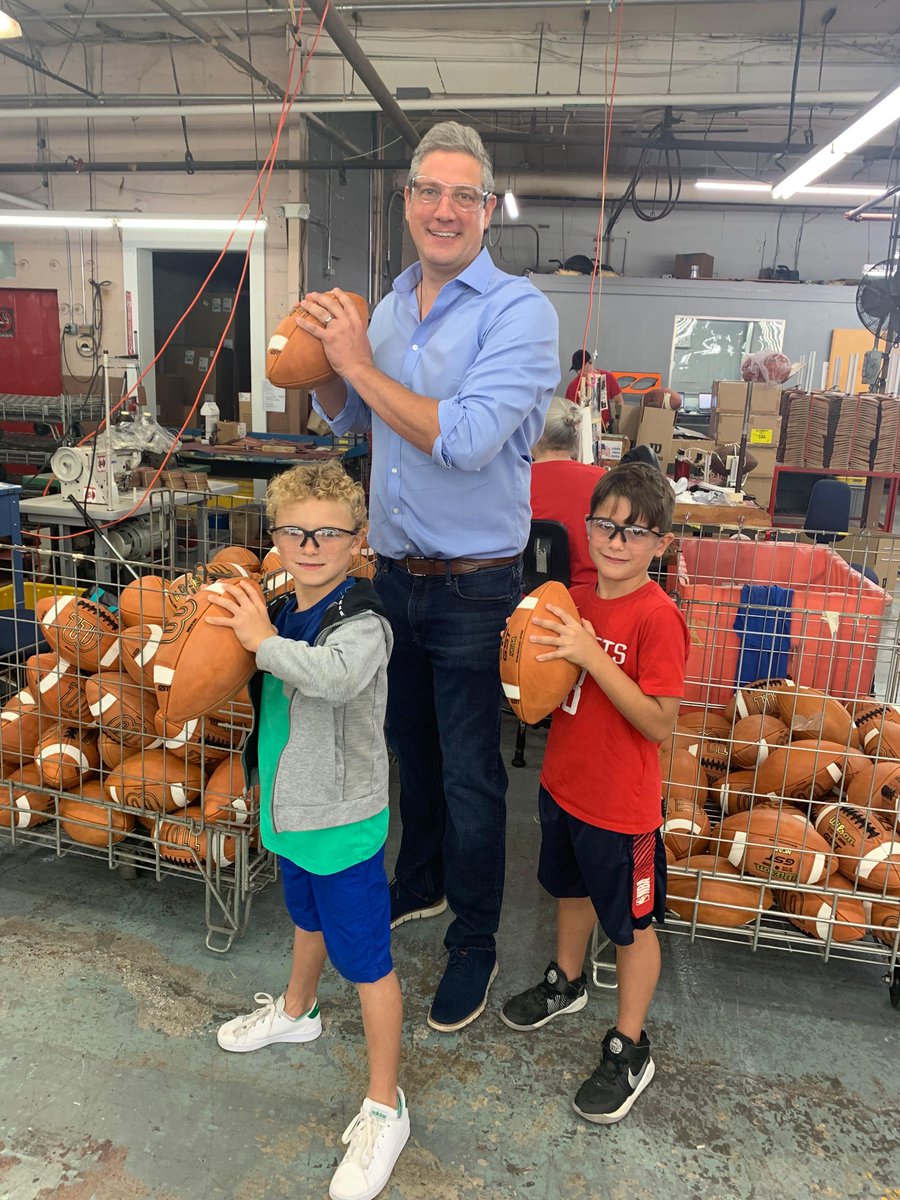 TimRyan's tweet photo. There’s nothing more American than football and here in Ada, Wilson is manufacturing leather goods for our favorite pastime. 

We won’t need a Hail Mary to bring back manufacturing jobs if we invest in businesses that do right by workers and keep jobs in our state now. https://t.co/BI1y3RhE5m