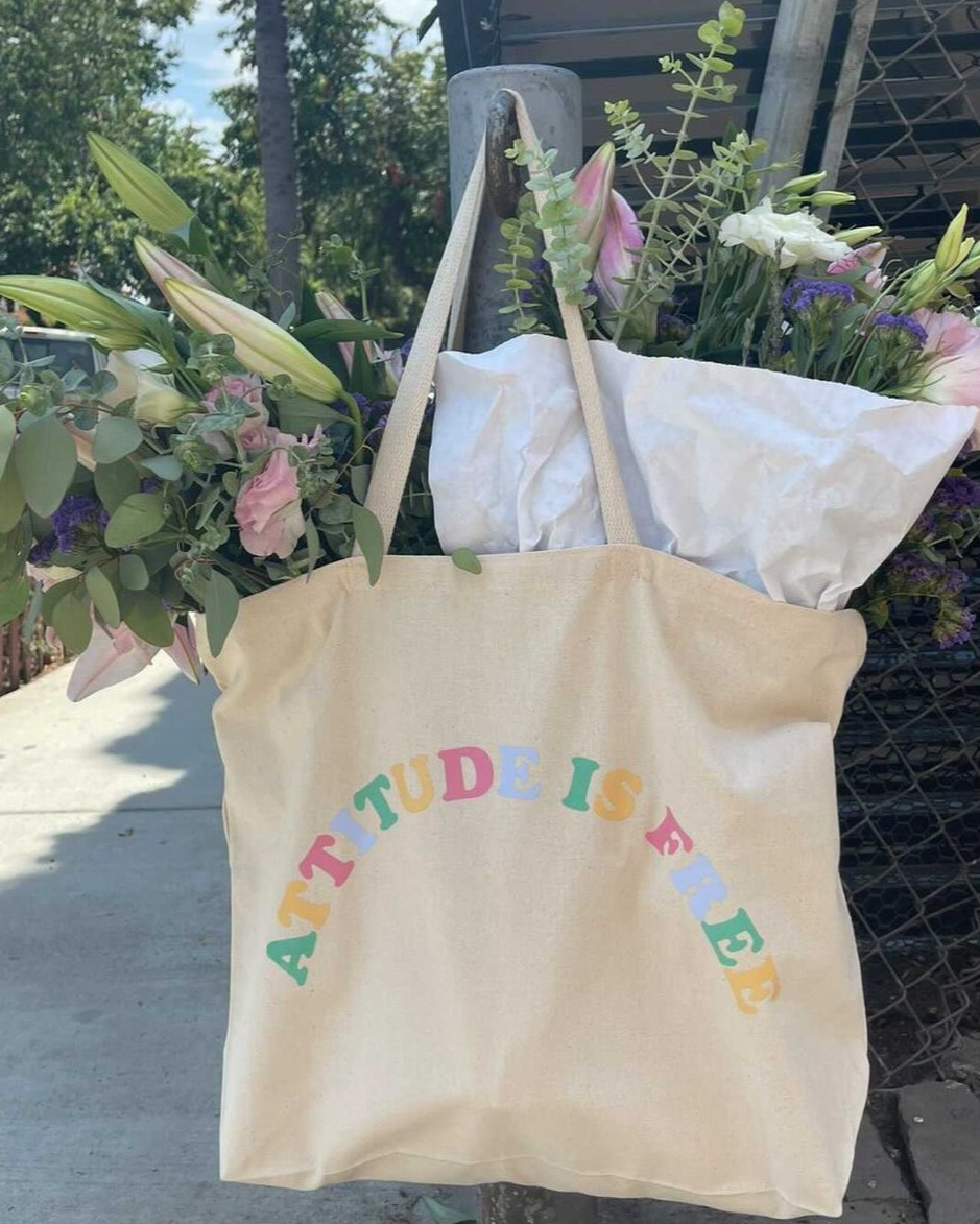 AIF Tote Bag in all its glory 🌸 

Tap + Shop