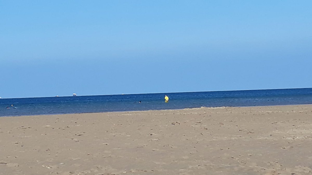 Beach Day at Lligwy Beach. you can just make out the yellow dot in the sea that is Mart. 
Meanwhile Ellis is floating off somewhere in the distance😂😂