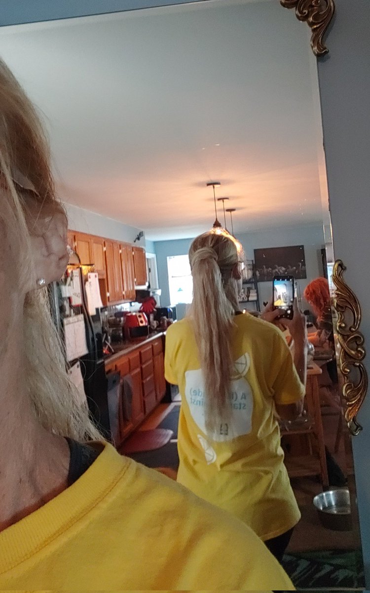 carolinecasekc's tweet photo. With my cowgirl hat for the Garth concert Sat, should I braid it or straighten ? https://t.co/84ZLC4OpiC