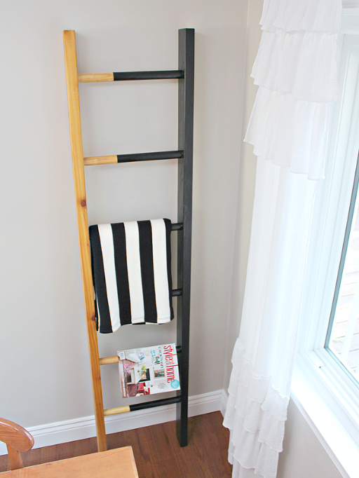 Keep all your magazines and cozy throws within reach by displaying them on a chic DIY ladder! goo.gl/M9Hz7t