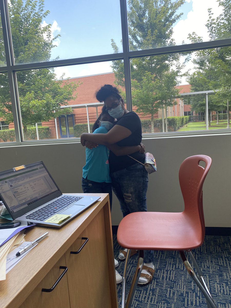 JLewisInvictus's tweet photo. This was one of the highlights of our first day. Mom used to attend this school when it was West Fulton. Today, she registered her daughter. It’s the hug for us. Welcome to all our new Royal Lions. @JLIAPRIDE #NOW @ApsDream @apsupdate https://t.co/9tmwwsSrzo