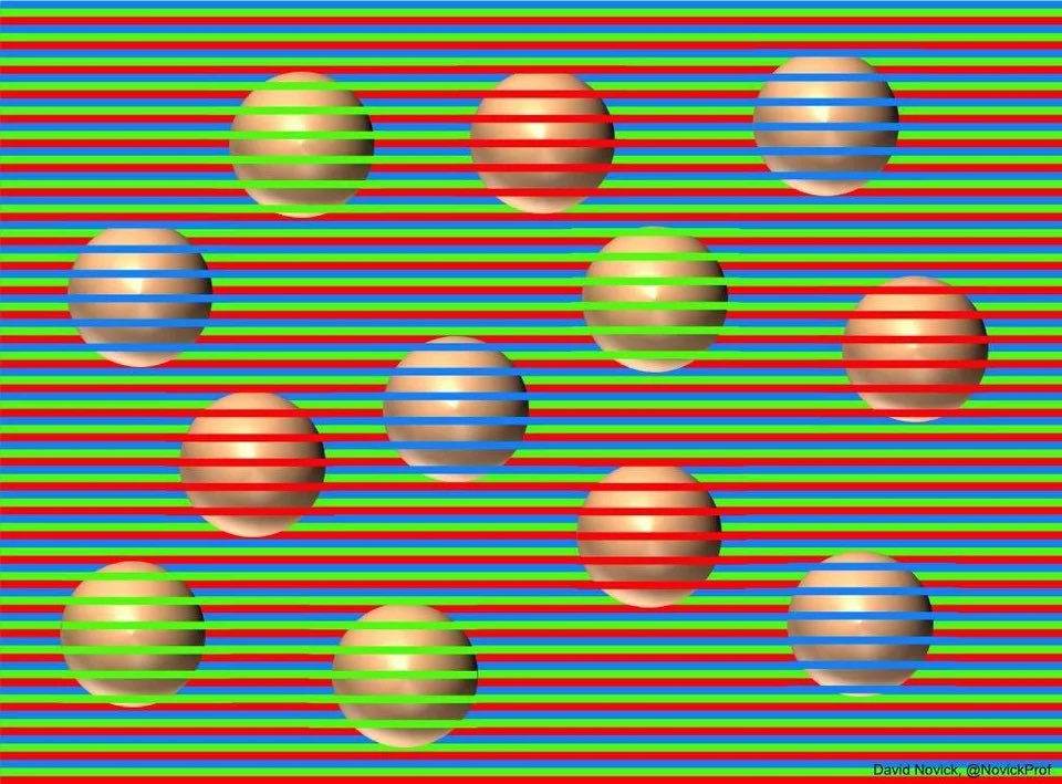 All these balls are actually brown (zoom in). 

A wonderful illusion from <a href="/NovickProf/">David Novick</a>