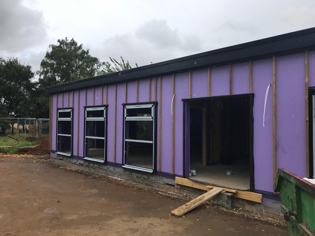 A sea of timber, windows and purple 😍💜

Our latest primary school build in Everton looking great... also, how organised, neat and tidy is this project site!

#passiveschools #intelligentmembranes #construction #build #carpentry #building #passivehouse #passivehaus #details