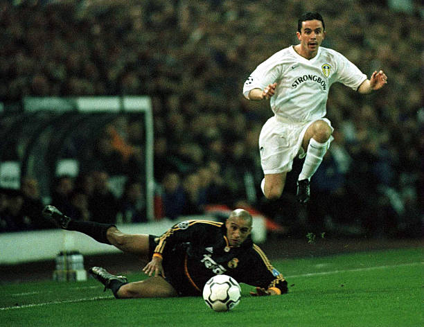 irish_pics's tweet photo. Gary Kelly in action in the Champions League against Real Madrid's Roberto Carlos at Elland Road in November 2000 https://t.co/RNsWf0oszK