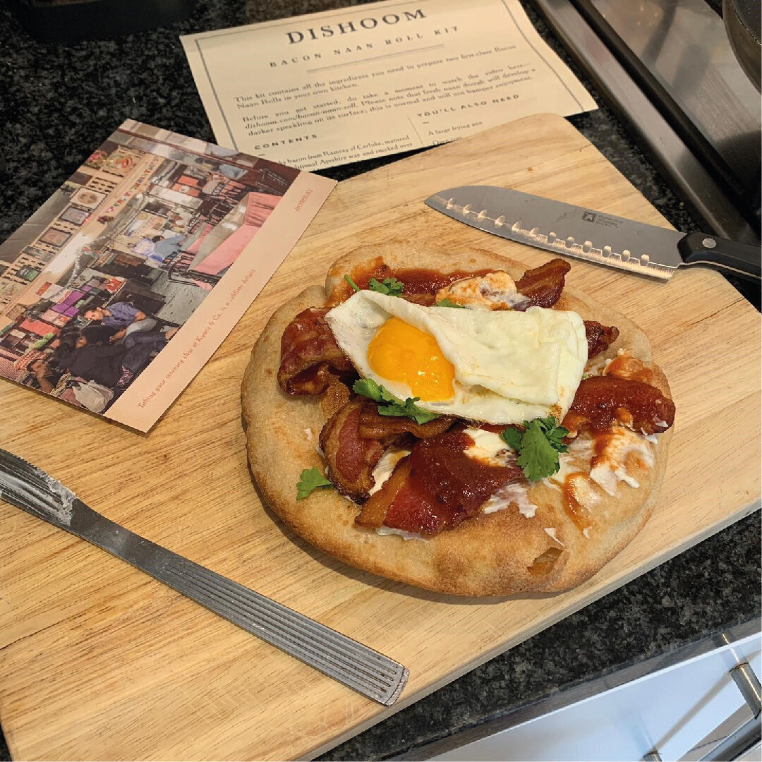 RidgemountUK's tweet photo. Friday work treats for the Ridgemount team. Here’s Ting’s amazing bacon naan creation from Dishoom. https://t.co/YTR3QwZALg