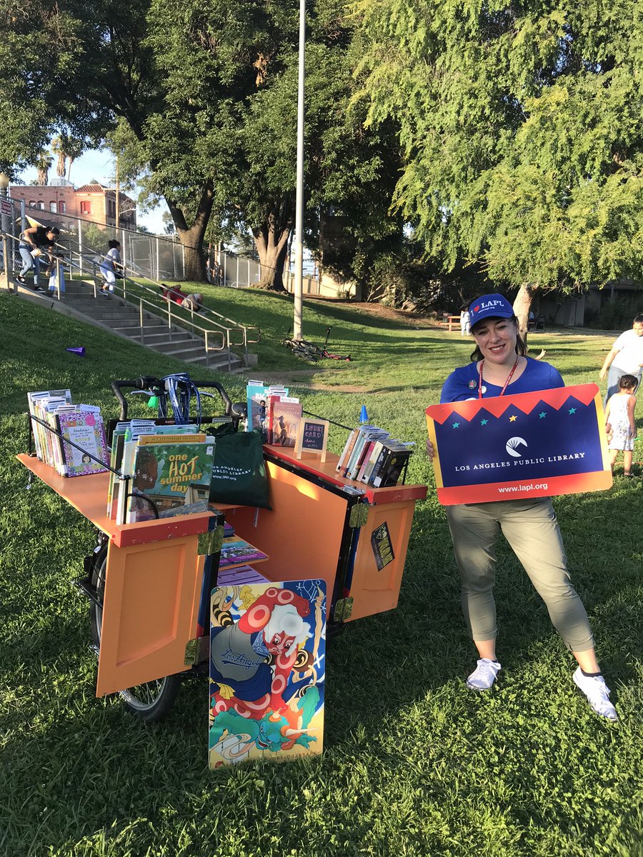 Librarygal05's tweet photo. #FlashbackFriday at a summer night lights event #bookbikeweek @LAPLBookBike @LAPublicLibrary https://t.co/k30KHAYz4I
