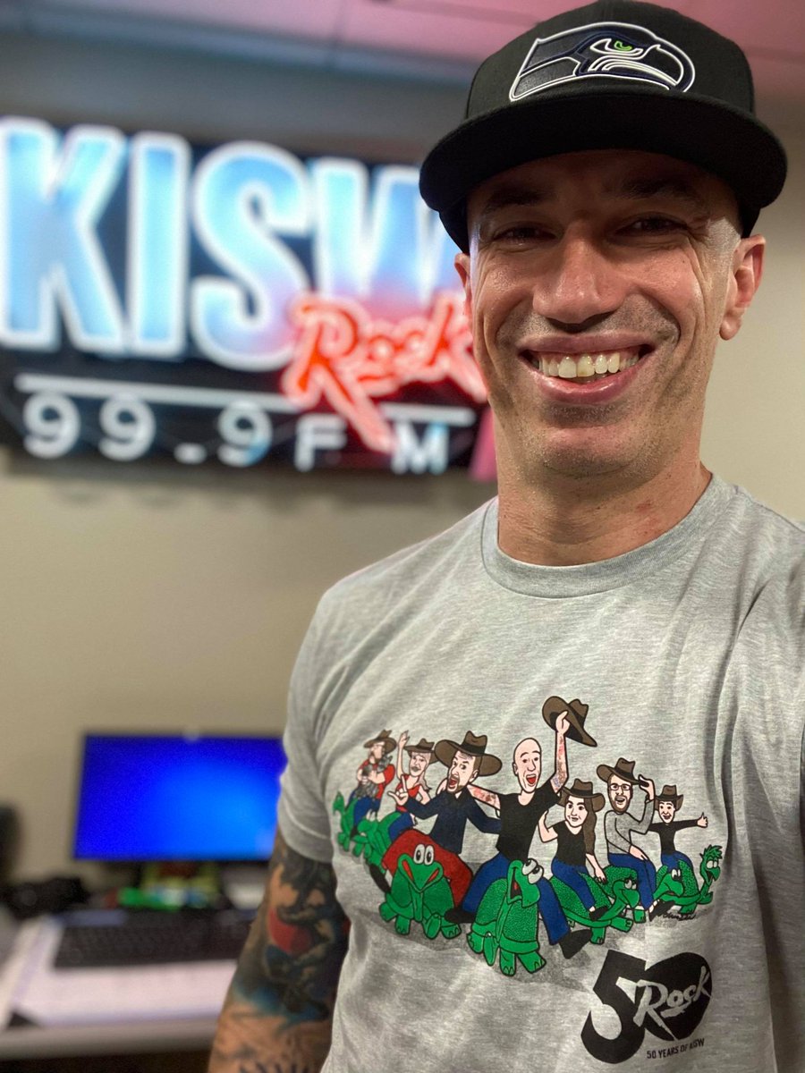 999KISW's tweet photo. Are you rocking your #RideTheTurtle shirt this summer? Let's see those pics! Don't have yours yet? Get it here: https://t.co/qQptwwt3Ce -@BJandMigs https://t.co/LtmyMuDqRx
