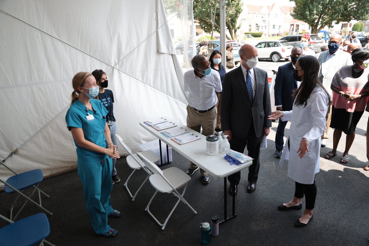 Governor Wolf at an order vaccine clinic with vaccine workers around him