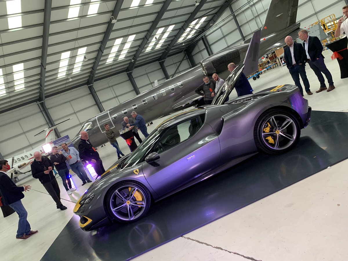 WoodgateAir's tweet photo. This is exquisite from the masters @Ferrari The new 296 GTB draws appreciative fans of the iconic brand to the Ireland launch in our hangar. @CH_Specialist https://t.co/JIWwmaalJm