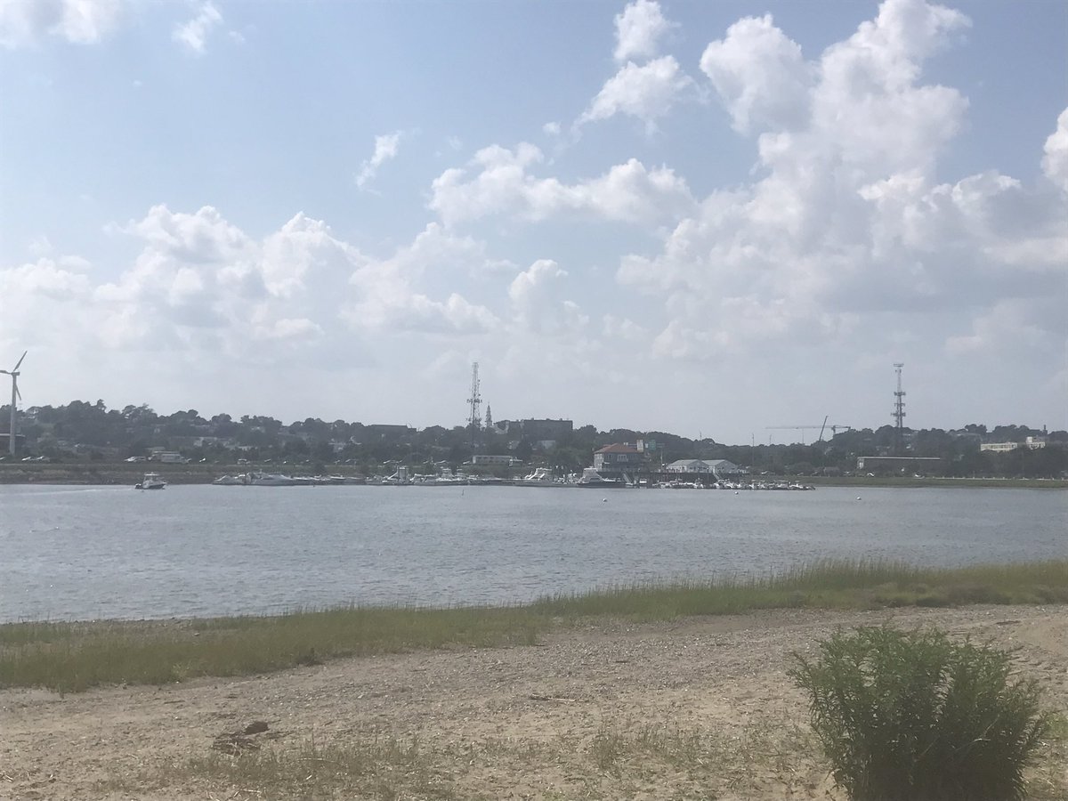 PaulNuttingJr's tweet photo. #cranewatch an unusual sight on the #Dorchester skyline #dotblock @BosBizJournal Competes with cell towers, wind turbine and First Parish spire. https://t.co/we1yNqRTIw