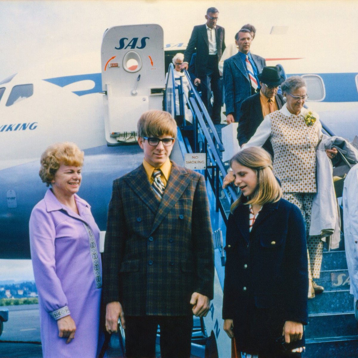 RickSteves's tweet photo. 50 years ago, flying was a big deal. Here I am at age 16, all dressed up with my mom and sister, ready to board a transatlantic flight — and taunting the world: “Come on, come on! Wallop my ethnocentrism! Go ahead…rearrange my cultural furniture!” https://t.co/HiPOQFbfTM
