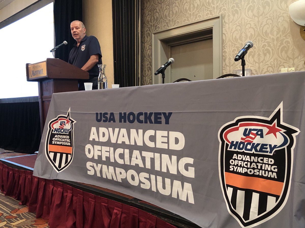 USAHMagazine's tweet photo. Mark Rudolph, the driving force behind USA Hockey’s officiating education program, addresses the audience at the 2021 Advanced Officiating Symposium as the keynote speaker. #usahaos https://t.co/sr0ZJAQbjW