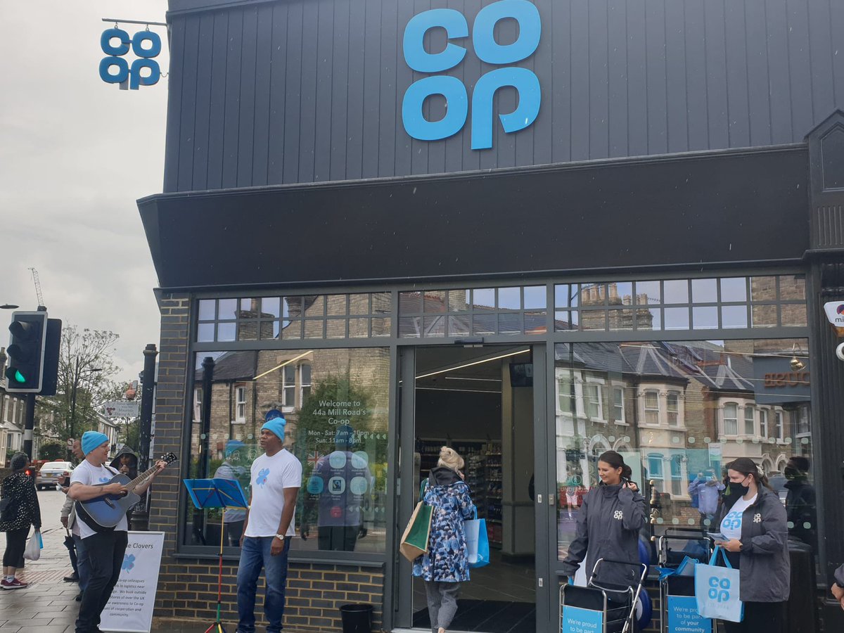 TheBlueClovers's tweet photo. We had a great session today (in between the rain drops!) at the new Mill Road Store in Cambridge. Thanks to @LiamSylvester for inviting us down and to the Coop Marketing Team for keeping us company out front! @MelApplewhite1 #itswhatwedo #theblueclovers #teamlogistics @coopuk https://t.co/GGReWJf6WG