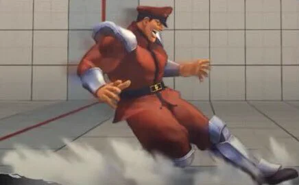 M. Bison (Dictator) using his cr.HK, a move where he slides half-screen.