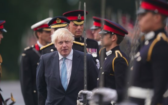 Boris Johnson inspects army officers as Darth Vader's 'Imperial March' plays