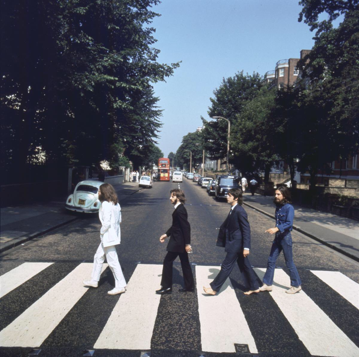 BeatlesEarth's tweet photo. Today in 1969, The Beatles crossed Abbey Road for an album cover photo-shoot and created one of the most recognizable and most iconic album covers in history. https://t.co/l2z1mhnUN5