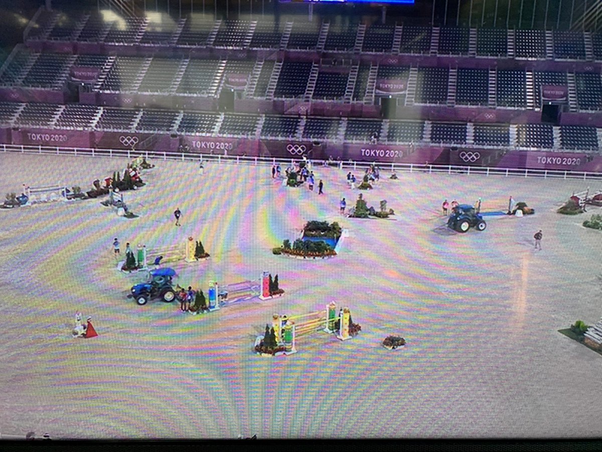 Some images from #TokyoOlympics - Nice looking tractors grooming the #equestrian Individual Show Jumping Competition...