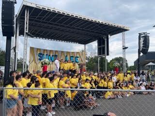 ChuckWiger's tweet photo. Thousands of Minnesotans &amp; more celebrating Suni Lee’s amazing Olympic champion accomplishments at a parade and program at Aldrich Arena. We are so proud of you, Suni! 
😊🌈🥇

@sunisalee_: “Follow your dreams. Never give up!”

#MinnesotaProud #TeamUSA #SunisaLee #Olympics [1/2] https://t.co/B0RefE3qG8