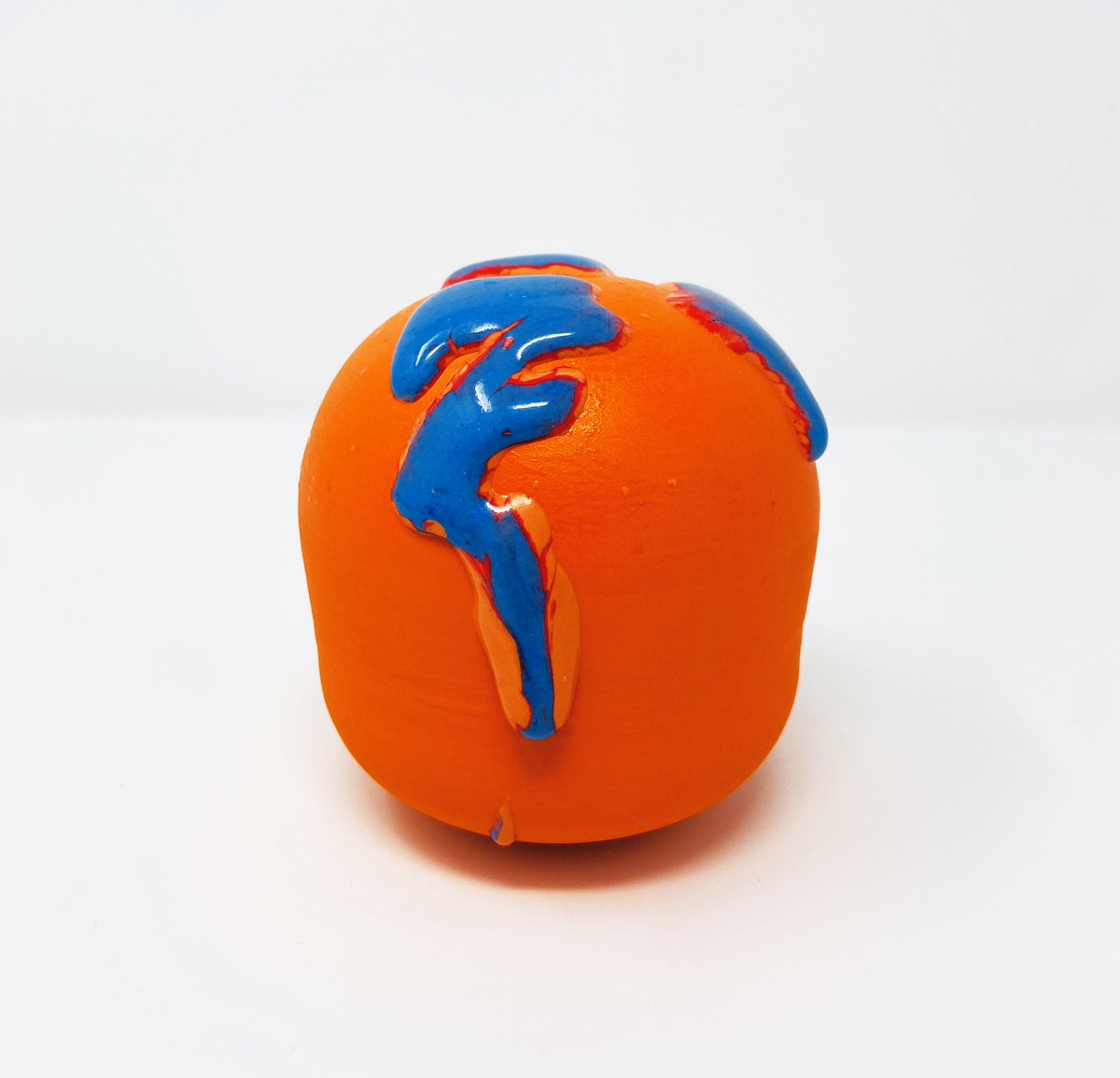 I made this little sculpture. It has no hole so I guess it’s not a vase.