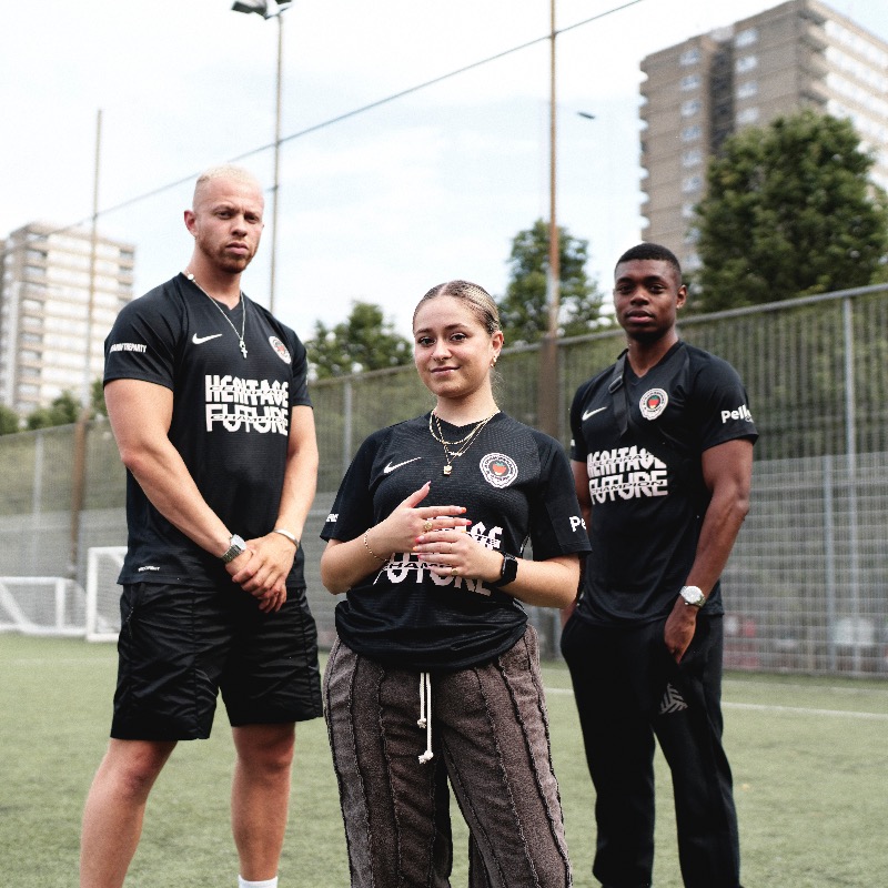SoccerBible's tweet photo. 🎵x⚽️ Setting up to celebrate the return of both sport and music fans alike to stadiums across the country, @SandCFestival have teamed up with @ProD_Soccer and Pello for a special edition football shirt that celebrates heritage and champions the future.