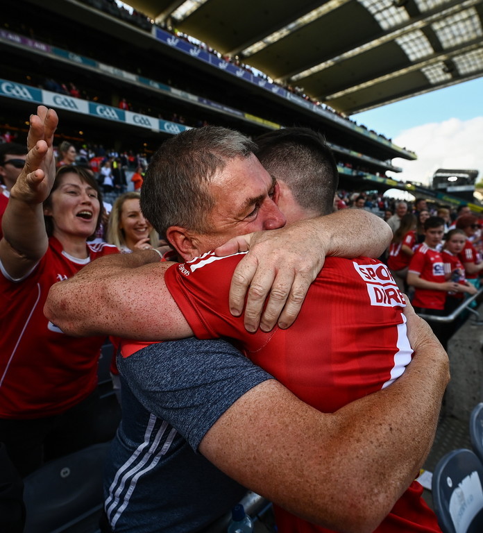 ballsdotie's tweet photo. Seán O'Donoghue finds his father Paddy in the crowd after @OfficialCorkGAA beat Kilkenny on Sunday. (📸: @sportsfile) https://t.co/5wuAARJzaP