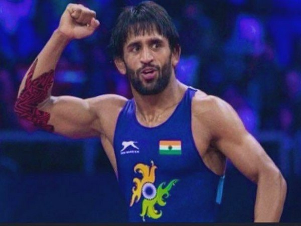ANI's tweet image. Lovely Professional University will gift Rs 50 lakhs to #Olympics gold medalist Neeraj Chopra, who is pursuing BA from the university. They'll also reward bronze medalist wrestler Bajrang Punia with Rs 10 lakhs. Punia is pursuing his MA in Public Admn from LPU.

(File pics)
