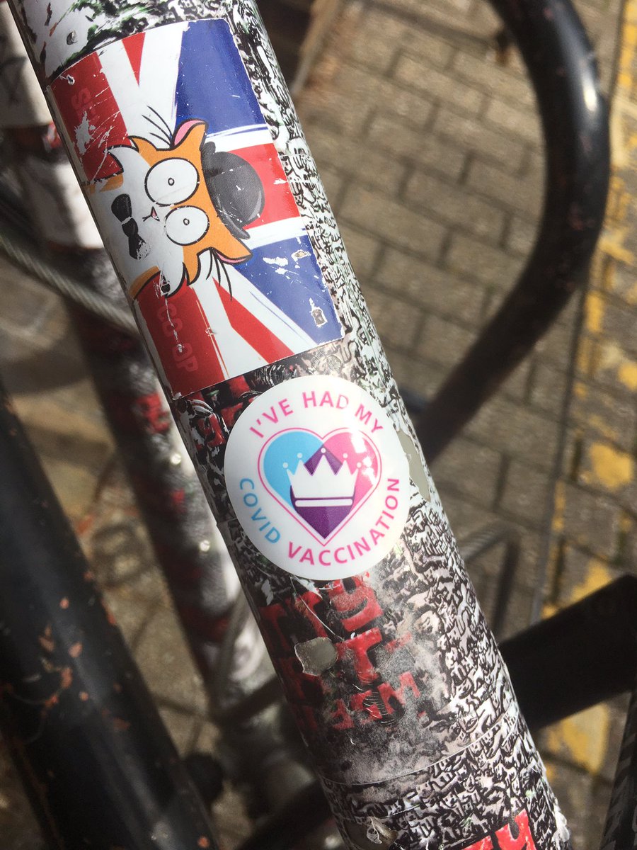 stuffByBez's tweet photo. Got my second vaccine.

Now to cycle 7 miles back home.

And I got a few new stickers for my bike to add to the existing stickers:  (#KittyCataclysm), @semicoop (uk cat) @CocktailGames (Top 10) @nowplaythese, @SciGalleryLon, and dancing name stickers. https://t.co/C7Lx0Gu5Nt