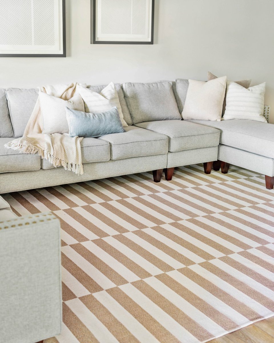 A neutral base with a twist! The subdued hues and fun geometric pattern of our Georgia rug make it the perfect choice for catching guests' eyes without taking away from the surrounding decor!---bit.ly/3B0U94k