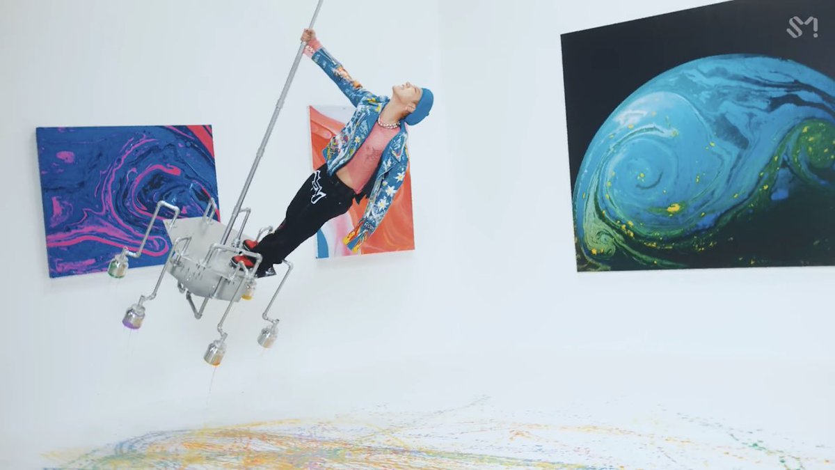 seetheTEN's tweet photo. Ten in #PaintMeNaked_MVTeaser, 2021 // "Chalice of Chaos" technique in painting by Callen Schaub, using a swinging bucket of paint with holes that allow the paint to flow out into the canvas https://t.co/wWu2e9QNsM