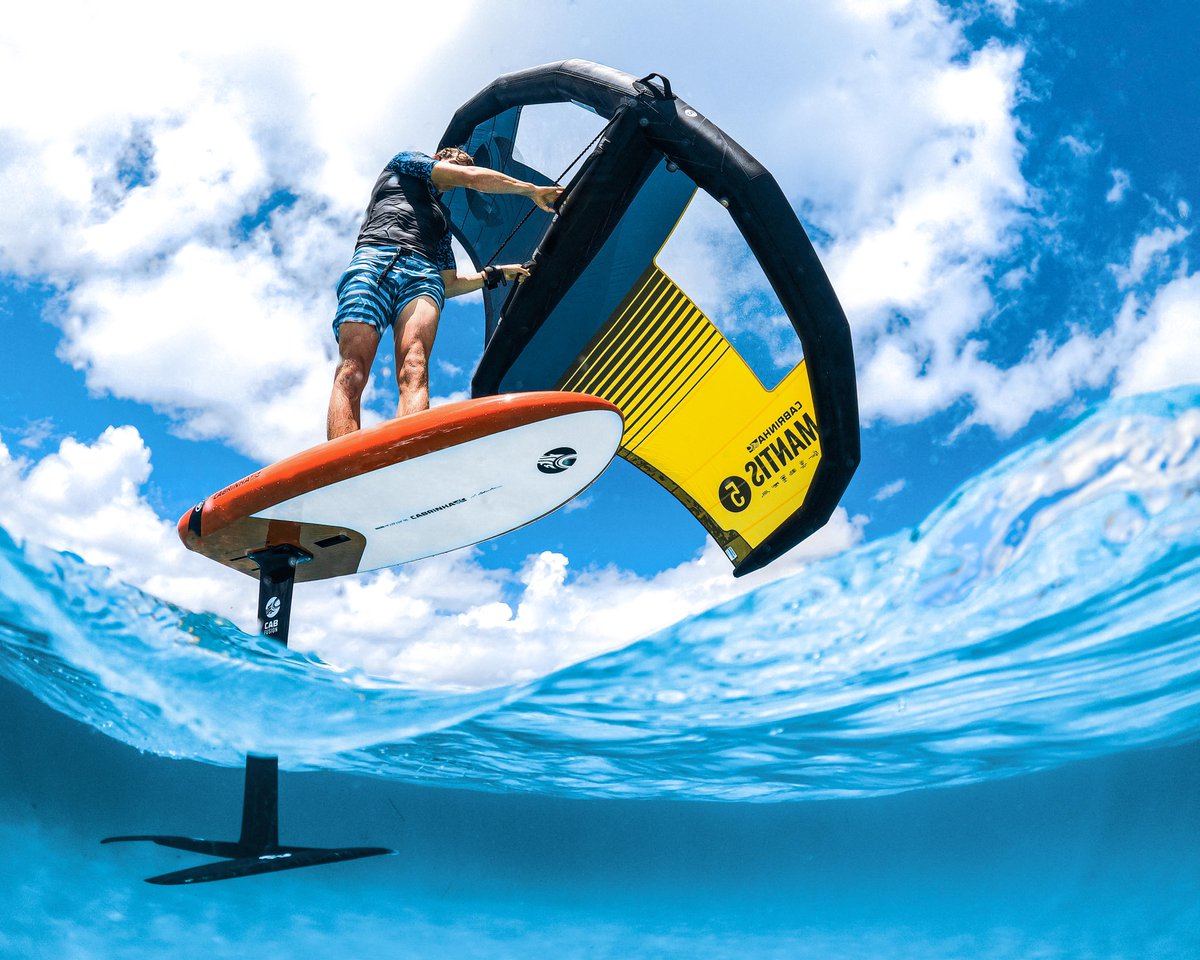 GoPro's tweet photo. Photo of the Day: Innovation at its finest 🦋 Have you ridden a #WingFoil yet? 📷 Theo Demanez + #GoProHERO9 Black

#GoPro #Foil #OverUnder #Caribbean https://t.co/22G8o2qtUV