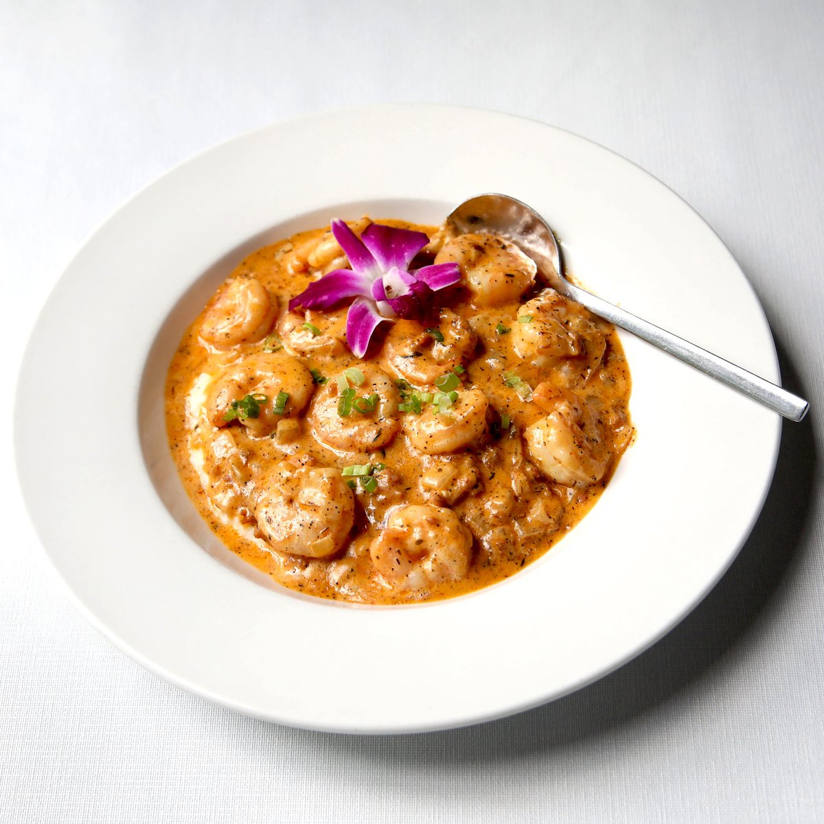 PrivatePropSC's tweet image. The fresh ingredients in our Shrimp &amp;amp; Grits — including stone-ground @Adluh grits and Tasso cream sauce — are cooked to perfection for a complete, hearty meal that pairs well with our Neyers Chardonnay. We sea you ordering one of these for dine-in or takeout with us this week! 🍤