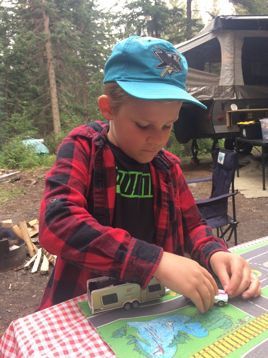 BLuchanski's tweet photo. My son has been living his best life this summer camping with my parents. Always rockinโ a 10 year old Surveyor Brettโs original Sharks cap #TealAttack https://t.co/RTbFU2xSNp