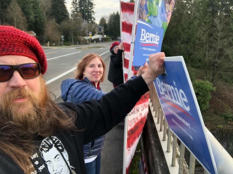 RedBeretsM4All's tweet photo. There we were, after the Run Bernie Run event, waving the Red Berets for Medicare for All hand painted banner over an Olympia overpass!
When it comes to showing up for healthcare justice, I KNOW we can always #CallOnJason‼️🧶🏩♥️
He’s an all fronts organizer!🍎 https://t.co/FwrdzLi44u