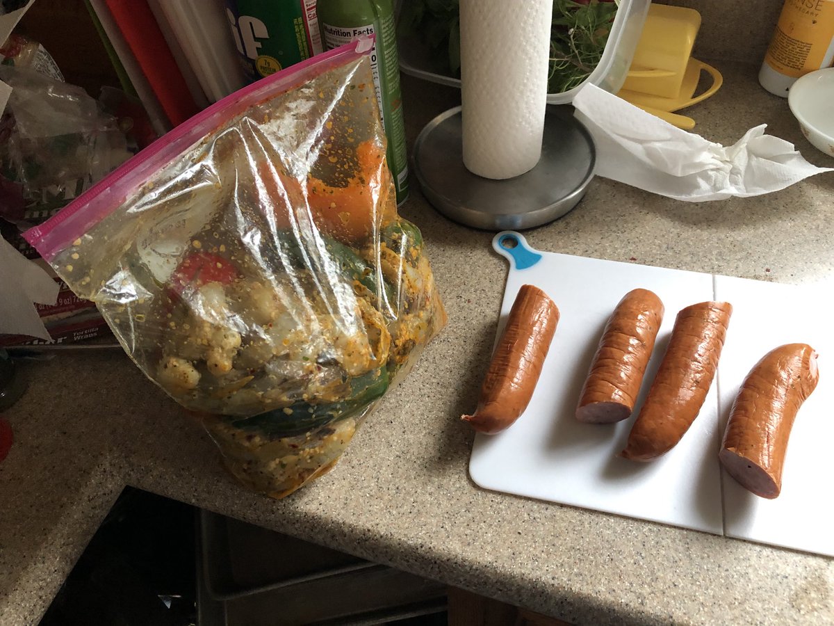 TheMarkMathur's tweet image. Spicy marinated raw shrimp with bell peppers and jalapeños as well as smoked kielbasa getting ready to go on the grill. #DinnerOfChampions