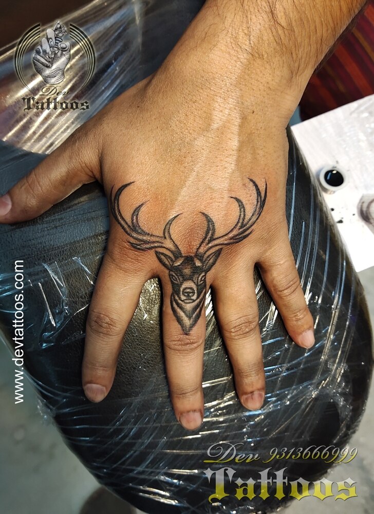 Colored deer tattoo on the wrist  Deer tattoo Silhouette tattoos Small  tattoos
