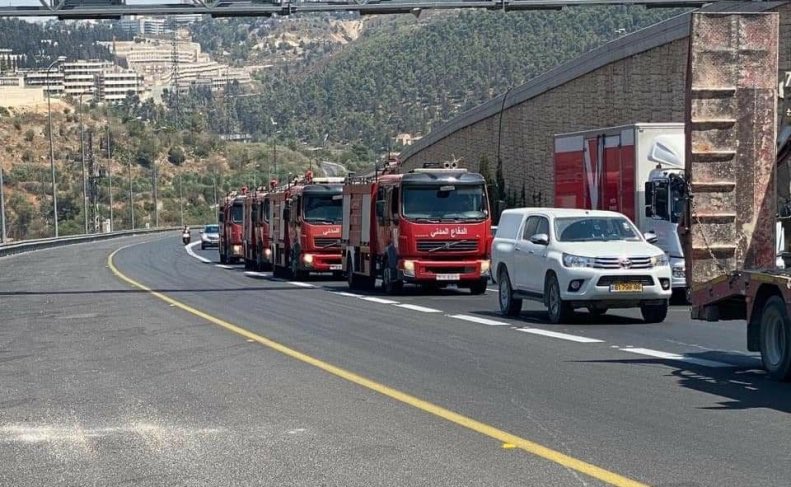 #Palestinian Firefighters on their way to assist in stopping Jerusalem fires.