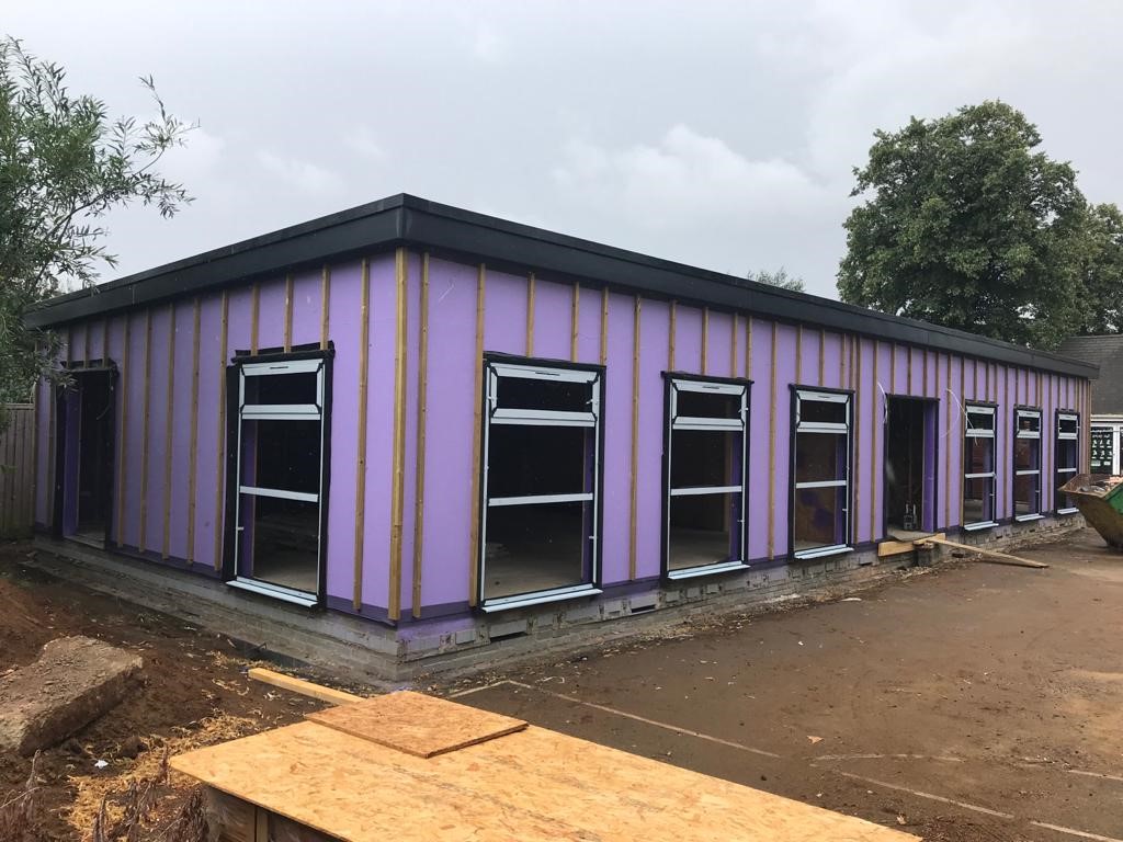 passive_purple's tweet photo. A sea of timber, windows and purple 😍💜

Our latest primary school build in Everton looking great... also, how organised, neat and tidy is this project site!

#passiveschools #intelligentmembranes #construction #build #carpentry #building #passivehouse #passivehaus #details https://t.co/LkUpQNH2mp