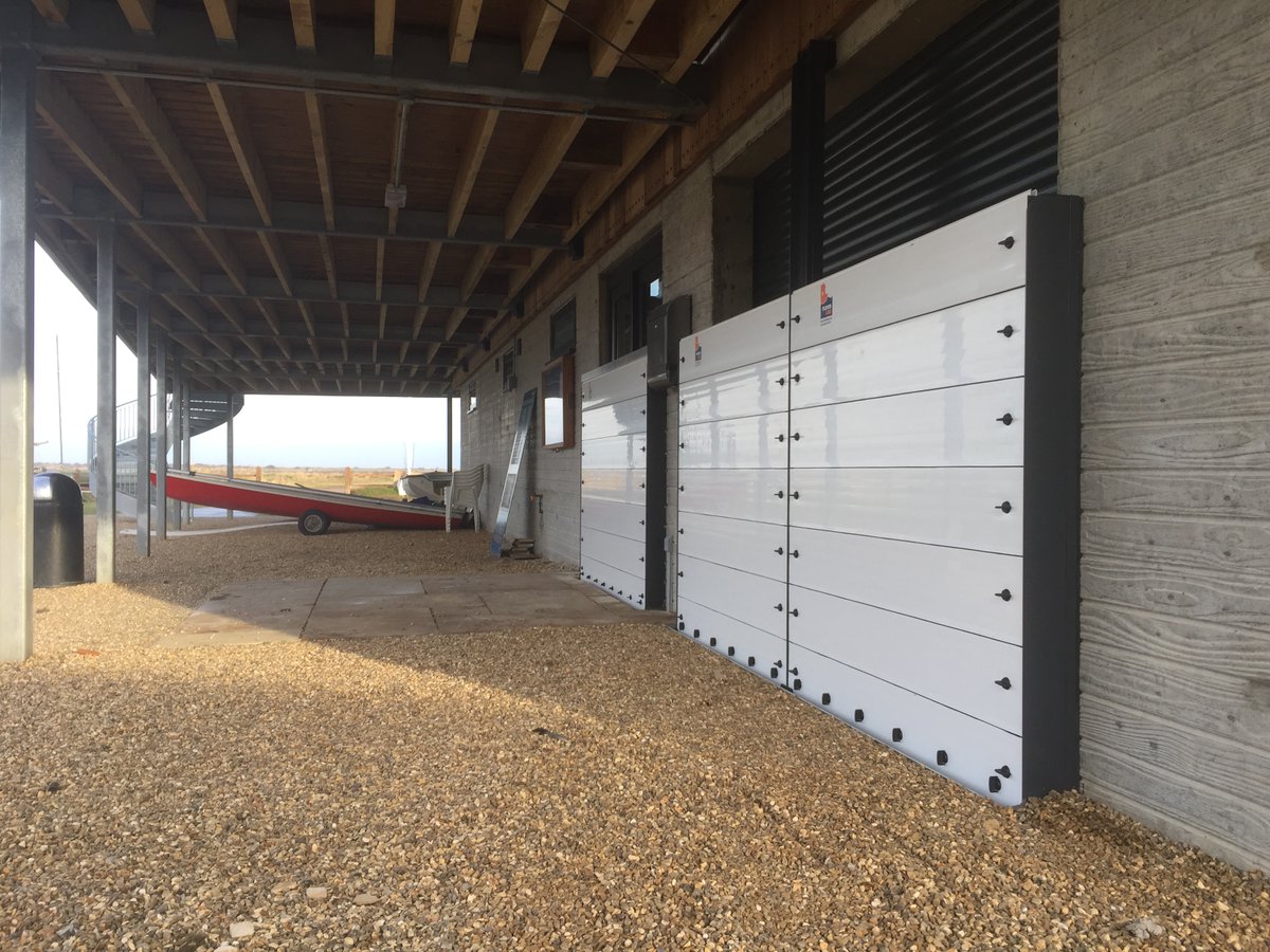 FloodArkLimited's tweet photo. Case Study: Brancaster Staithe Sailing Club

In December 2013, a devastating flood severely damaged the clubhouse at Brancaster Staithe Sailing Club. When the rebuilt building was opened in May 2016, our flood barriers had been incorporated. https://t.co/A2gsTWkgu1