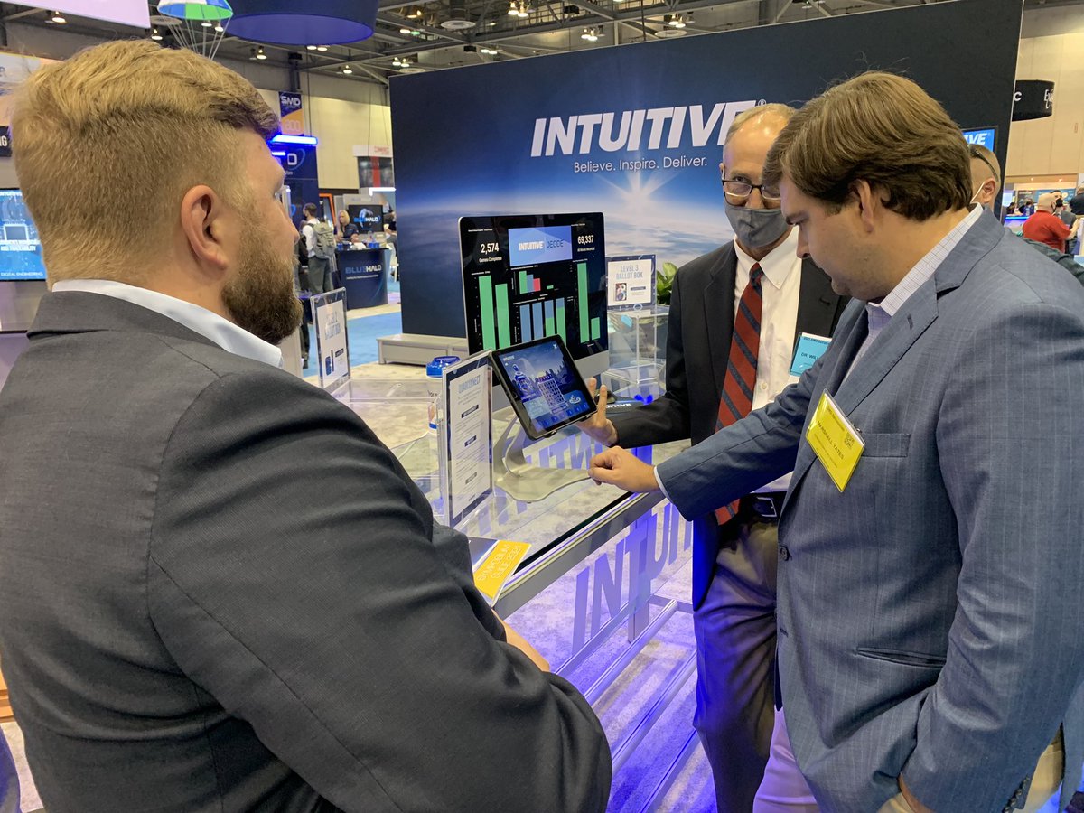 RepMoBrooks's tweet photo. My staff enjoyed visiting with Dr. Marx from Intuitive Research and trying to beat their Artificial Intelligence program in Connect 4! (They lost!) #smdsymposium https://t.co/eL9II3DhSI