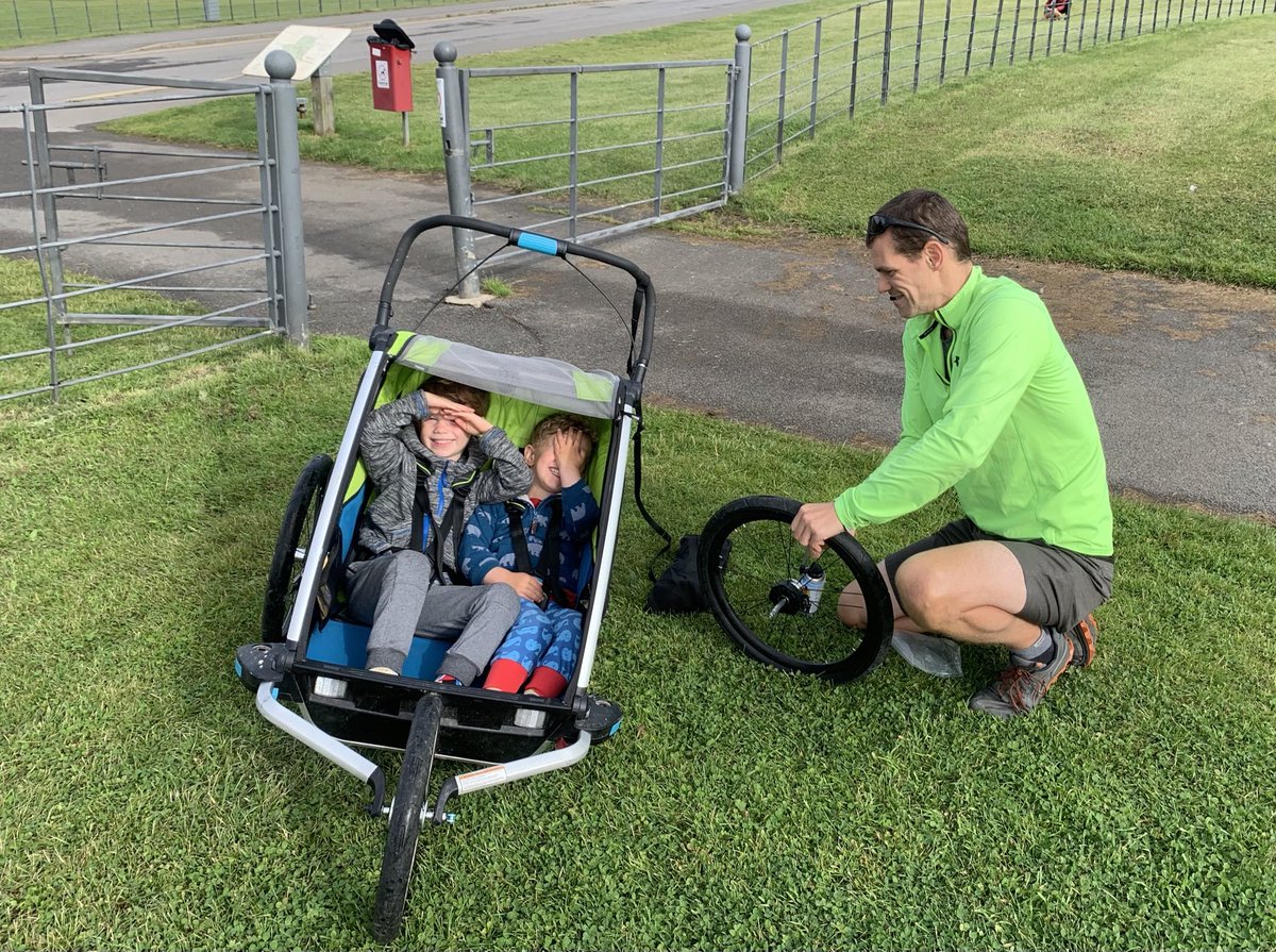 KeithTilmouth's tweet photo. Sometimes it all goes wrong at ⁦@parkrunUK⁩ as disaster struck for this buggy runner. Faster than a Formula One Team the tyre was fixed and off they went around Herrington Country parkrun. #loveparkun #buggyrunners https://t.co/cAORNcOaO6