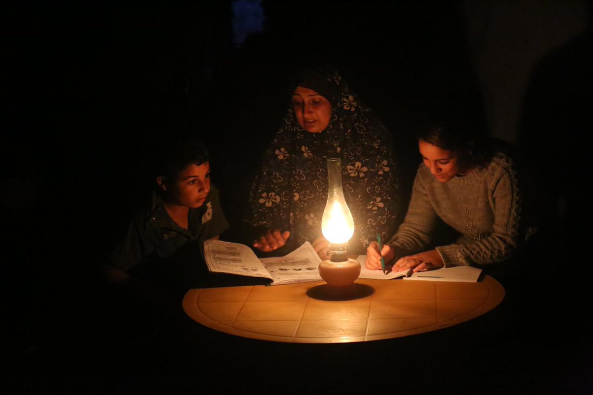 As the return to school approaches, Children struggle to do their homework in the dark. This is #Gaza, where due to power outages, 38% said they cannot complete their academic assignments. #Free_Palestine