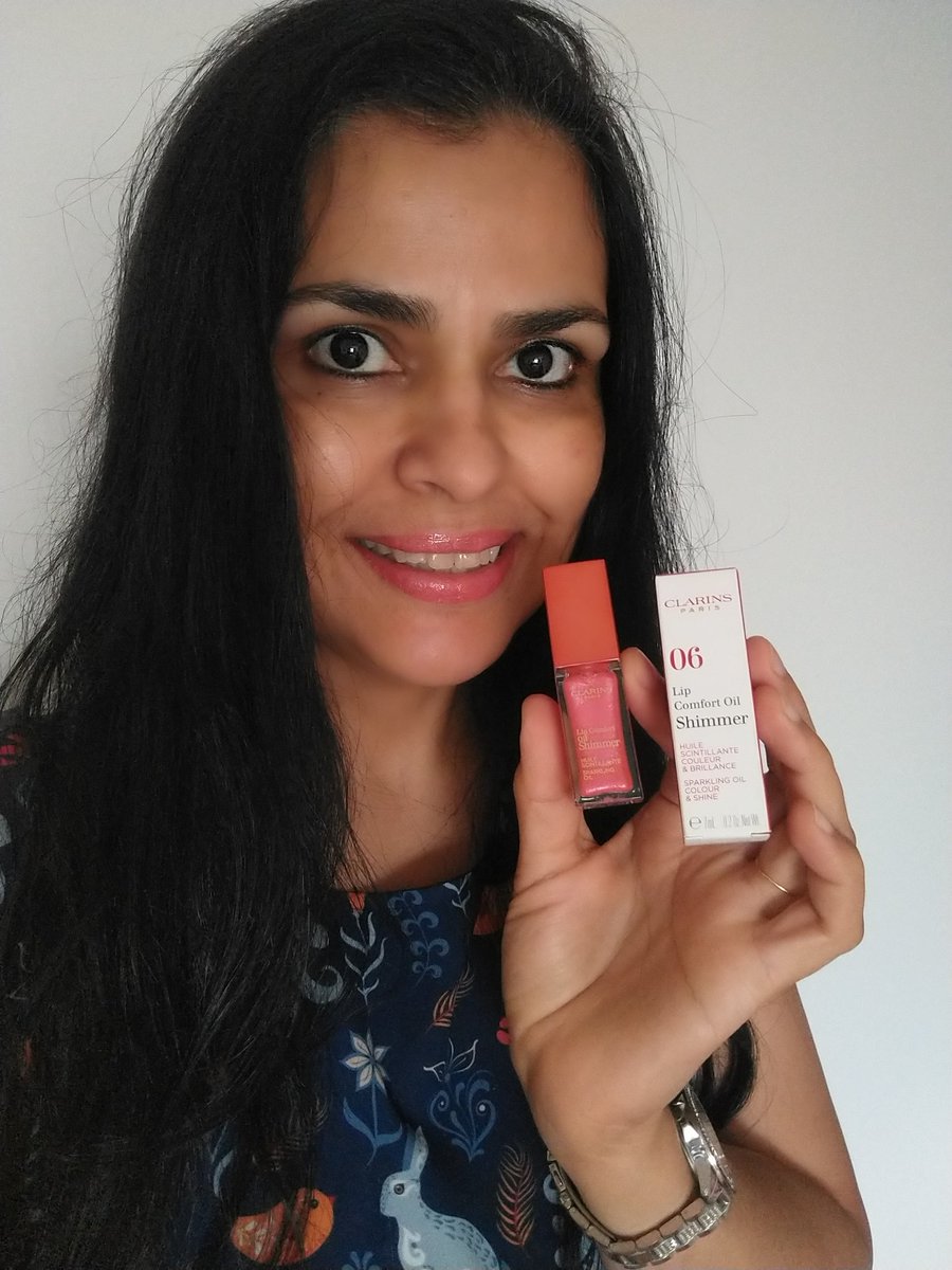 Luciana on X: @Influenster @clarinsusa I love the Clarins Lip Comfort Oil  Shimmer in the color 06 Pop Coral The packaging and color are gorgeous!Also  love the shimmer and how smooth it